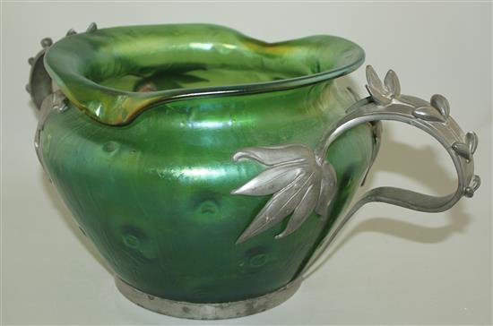 A Loetz style Art Nouveau iridescent green glass and pewter mounted bowl, c.1905, width 44cm